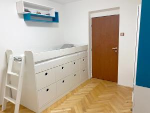 Postel nebo postele na pokoji v ubytování Apartmán na Perunské