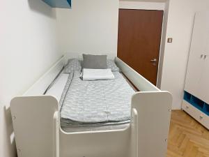 Postel nebo postele na pokoji v ubytování Apartmán na Perunské