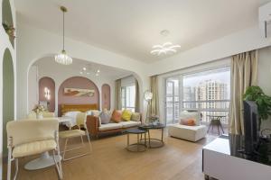 Zona d'estar a Sanya Zhi Ai Lily Seaview Apartment