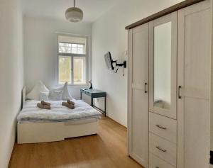 Postel nebo postele na pokoji v ubytování Apartmány Natálie