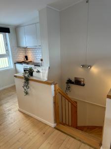 Kuchyň nebo kuchyňský kout v ubytování Illu Rental - Sea & City view Guesthouse