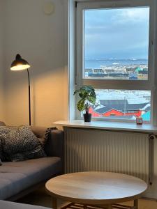 Posezení v ubytování Illu Rental - Sea & City view Guesthouse