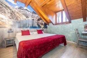 Кровать или кровати в номере San Anton Benasque