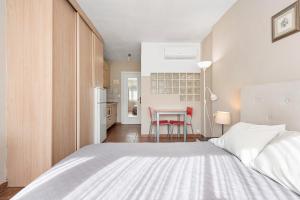Ein Bett oder Betten in einem Zimmer der Unterkunft Acogedor estudio en Pedregalejo junto al mar
