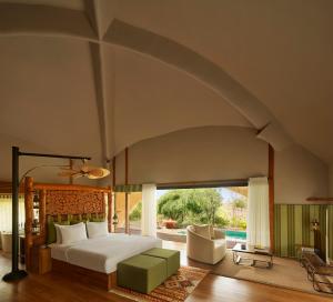 เตียงในห้องที่ Uga Chena Huts - Yala - All Inclusive