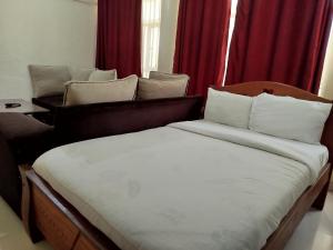Katil atau katil-katil dalam bilik di Serenity homes