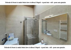 a bathroom with a shower with a mirror and a sink at CASTEL DI SANGRO - casa vacanza con wifi e posto auto vicino lo stadio in Castel di Sangro