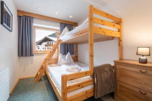Letto o letti in una camera di Apartmenthaus Beaverwier