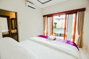 Ένα ή περισσότερα κρεβάτια σε δωμάτιο στο Turtle Shelter Guest House