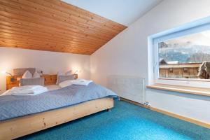 Letto o letti in una camera di Apartmenthaus Beaverwier
