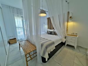 Posteľ alebo postele v izbe v ubytovaní Apartamento Bajo con terraza en Lorcrimar V + 27 fotografií