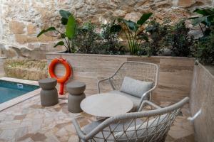 Bazén v ubytování Travi Boutique By Holi nebo v jeho okolí