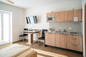 Kuchyň nebo kuchyňský kout v ubytování Boardinghouse Schellenberg