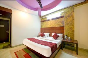 Postel nebo postele na pokoji v ubytování Hotel Re Pose Villa Near New Delhi Railway Station