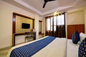 Postel nebo postele na pokoji v ubytování Hotel Re Pose Villa Near New Delhi Railway Station