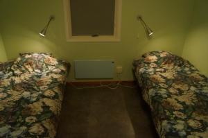 Letto o letti in una camera di Laplanders rooms