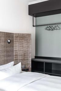 Postel nebo postele na pokoji v ubytování pentahotel Braunschweig