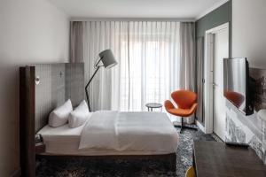 Postel nebo postele na pokoji v ubytování pentahotel Braunschweig