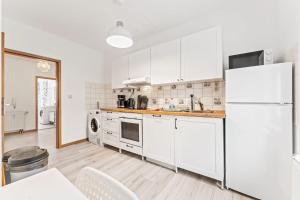 Nhà bếp/bếp nhỏ tại Chic Apartment with Parking place