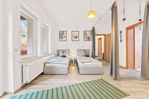 Ένα ή περισσότερα κρεβάτια σε δωμάτιο στο Nice Apartment with Balcony