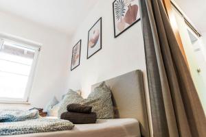 Ένα ή περισσότερα κρεβάτια σε δωμάτιο στο Nice Apartment with Balcony