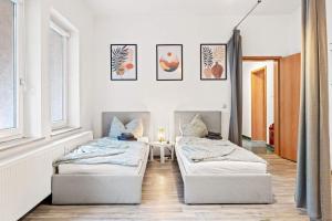 Ένα ή περισσότερα κρεβάτια σε δωμάτιο στο Nice Apartment with Balcony