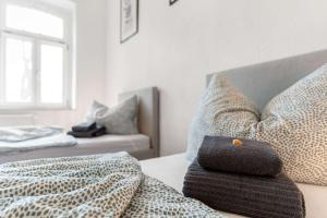 Ένα ή περισσότερα κρεβάτια σε δωμάτιο στο Nice Apartment with Balcony