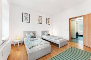 Ένα ή περισσότερα κρεβάτια σε δωμάτιο στο Nice Apartment with Balcony