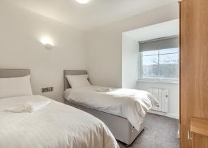 Letto o letti in una camera di North Devon Resort