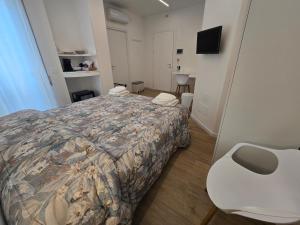 Letto o letti in una camera di Athena