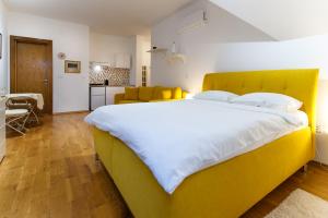 Postel nebo postele na pokoji v ubytování JEZERSKA RESIDENCE Palić