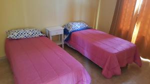 Ένα ή περισσότερα κρεβάτια σε δωμάτιο στο Apartamentos Los Teros