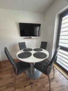TV a/nebo společenská místnost v ubytování Apartament Hey Gron