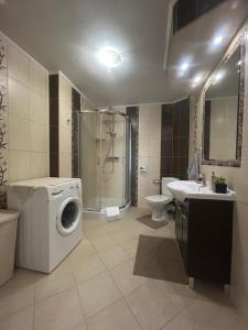 Koupelna v ubytování Apartament Hey Gron + 28 fotografií