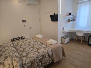 Letto o letti in una camera di Athena