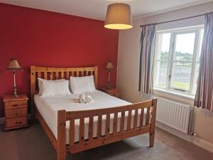Postel nebo postele na pokoji v ubytování Bunratty Holiday Homes