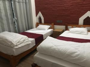 Postel nebo postele na pokoji v ubytování Mount Fuji Homestay