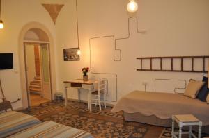 Postel nebo postele na pokoji v ubytování Zuppetta16 Apartments