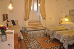 Postel nebo postele na pokoji v ubytování Zuppetta16 Apartments