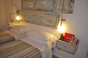 Postel nebo postele na pokoji v ubytování Zuppetta16 Apartments