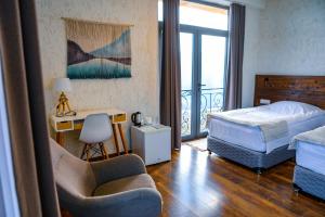 Letto o letti in una camera di Apaga Resort