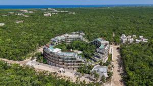 an overhead view of a building with trees on it at Loft Hermosa at Tulum's Mistiq Temple II Beaches in Tulum