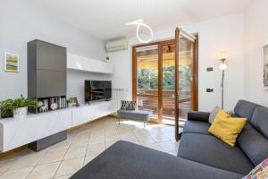 Χώρος καθιστικού στο Garda Tulipano tranquillo bilocale con piscina e terrazza