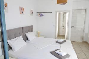 Postel nebo postele na pokoji v ubytování Ethereal - Seaview Apartment