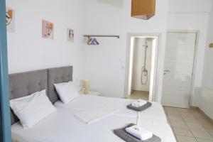 Postel nebo postele na pokoji v ubytování Ethereal - Seaview Apartment