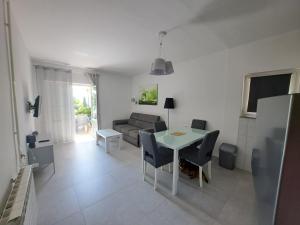 Posedenie v ubytovaní Apartments Žgogo