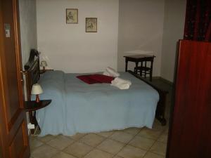 Postel nebo postele na pokoji v ubytování La Chicca B&B