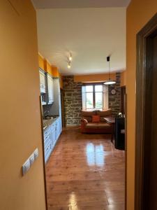 Kuchyň nebo kuchyňský kout v ubytování Apartamentos Helenias