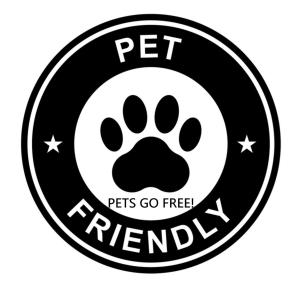 a black and white dog paw sign with the text pet referral at Thrillseeker - Chalet style caravan next to Fantasy Island, Ingoldmells, 2 dogs max - East Coast Holidays in Skegness