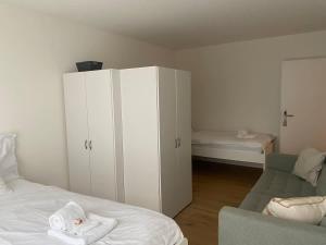 Postel nebo postele na pokoji v ubytování The R Apartment Adlisberg